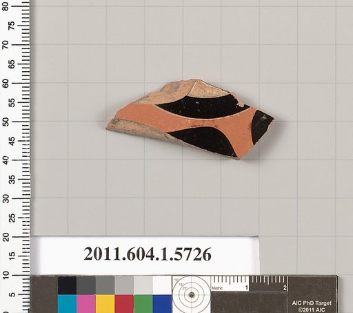 Terracotta fragment of a kylix: eye-cup  (drinking cup)