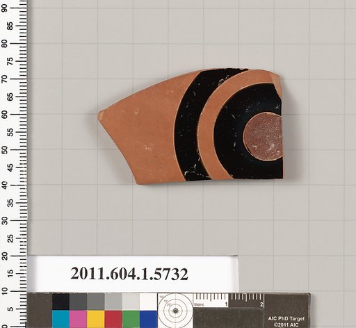 Terracotta fragment of a kylix: eye-cup  (drinking cup)
