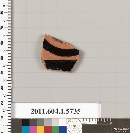 Terracotta fragment of a kylix: eye-cup  (drinking cup)