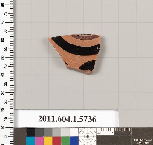 Terracotta fragment of a kylix: eye-cup  (drinking cup)