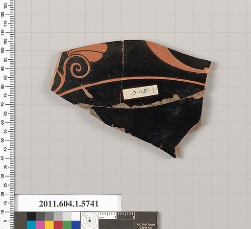 Terracotta fragment of a kylix: eye-cup  (drinking cup)