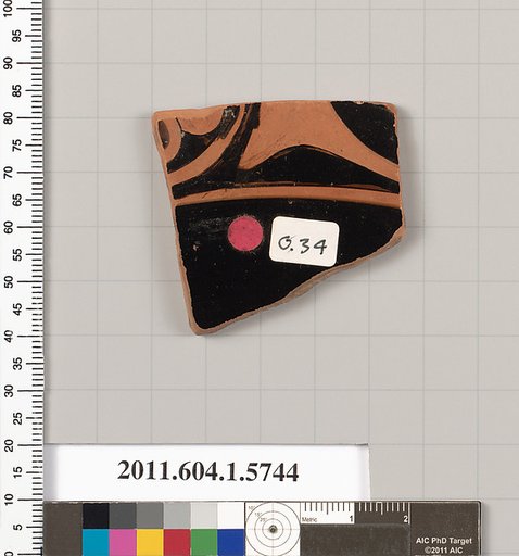 Terracotta fragment of a kylix: eye-cup  (drinking cup)