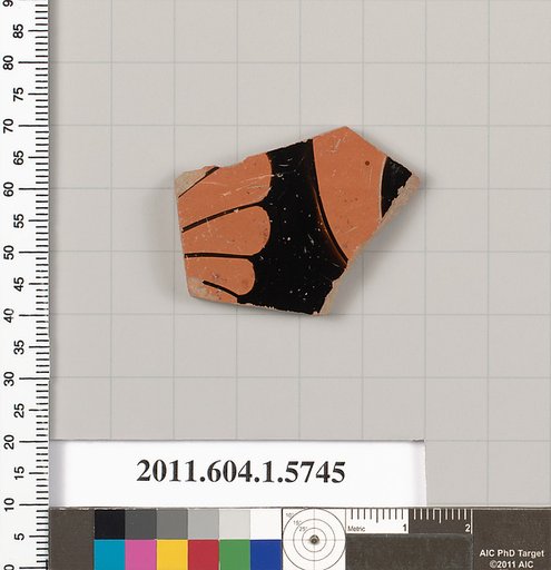 Terracotta fragment of a kylix: eye-cup  (drinking cup)