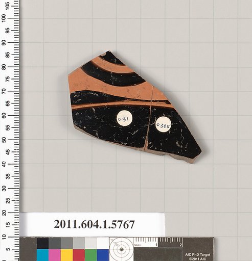 Terracotta fragment of a kylix: eye-cup  (drinking cup)