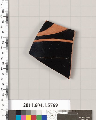 Terracotta fragment of a kylix: eye-cup  (drinking cup)
