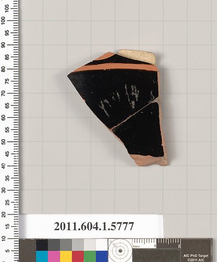 Terracotta fragment of a kylix: eye-cup  (drinking cup)