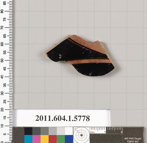 Terracotta fragment of a kylix: eye-cup  (drinking cup)