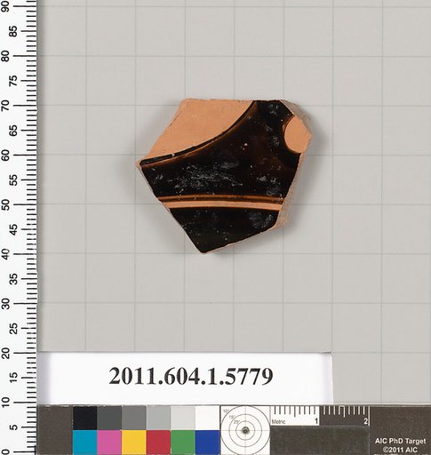 Terracotta fragment of a kylix: eye-cup  (drinking cup)