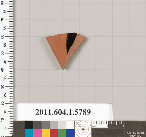 Terracotta fragment of a kylix: eye-cup  (drinking cup)