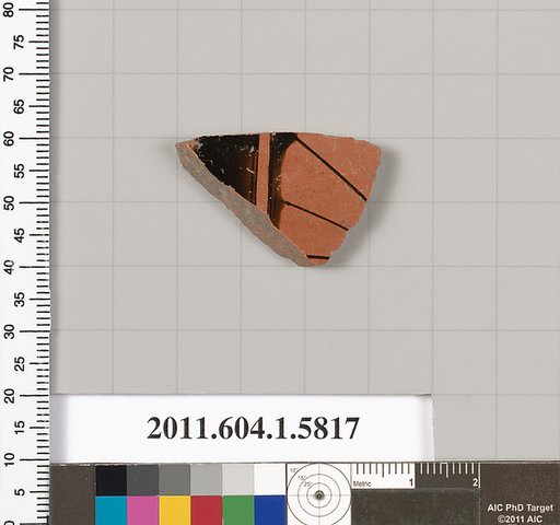 Terracotta fragment of a kylix: eye-cup  (drinking cup)