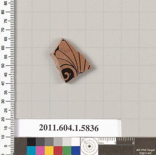 Terracotta fragment of a kylix: eye-cup  (drinking cup)