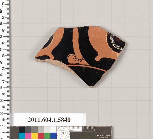 Terracotta fragment of a kylix: eye-cup  (drinking cup)
