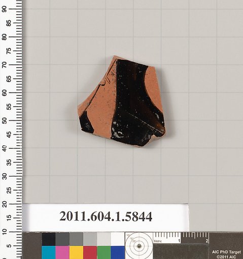 Terracotta fragment of a kylix: eye-cup  (drinking cup)
