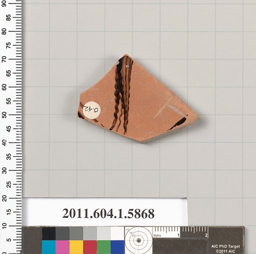 Terracotta fragment of a kylix (drinking cup)
