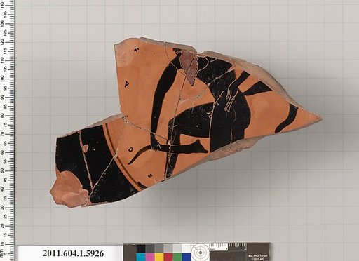 Terracotta fragment of a kylix (drinking cup)