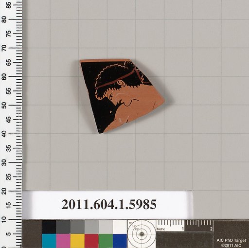 Terracotta rim fragment of a kylix (drinking cup)