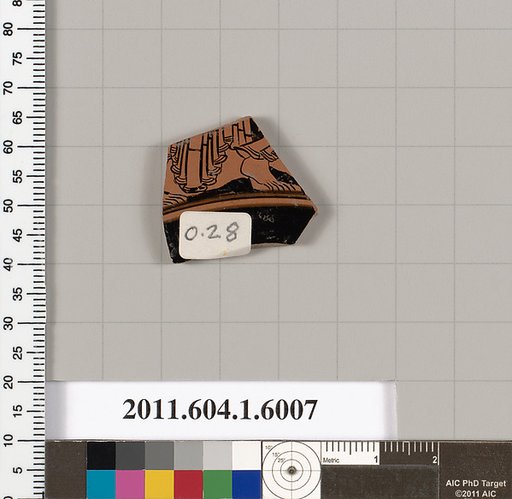 Terracotta fragment of a kylix (drinking cup)