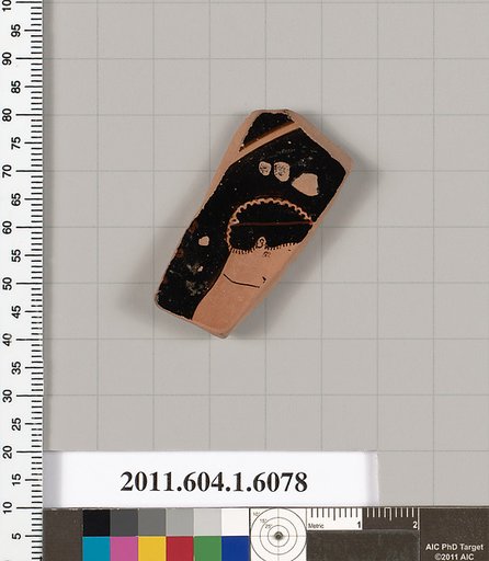 Terracotta fragment of a kylix (drinking cup)