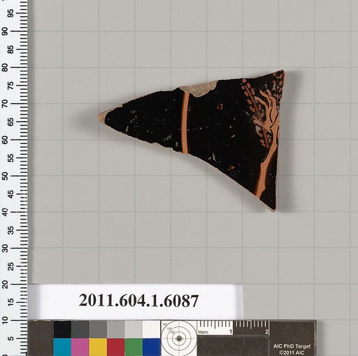 Terracotta fragment of a kylix (drinking cup)