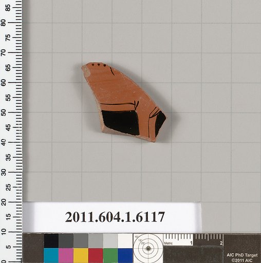 Terracotta fragment of a kylix (drinking cup)