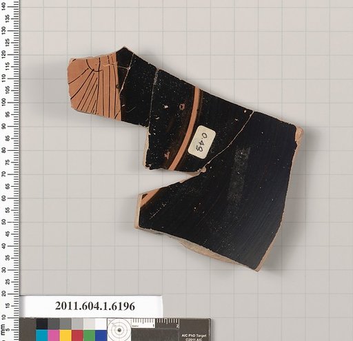 Terracotta fragment of a kylix (drinking cup)