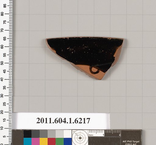 Terracotta rim fragment of a kylix (drinking cup)