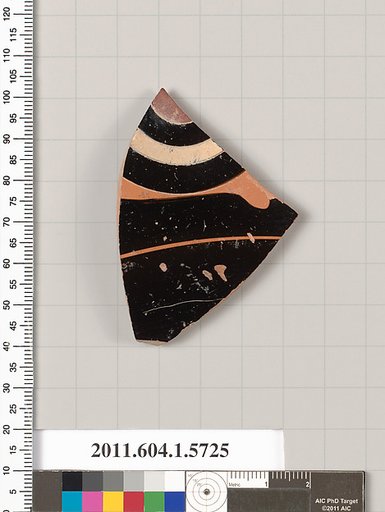 Terracotta fragment of a kylix: eye-cup  (drinking cup)