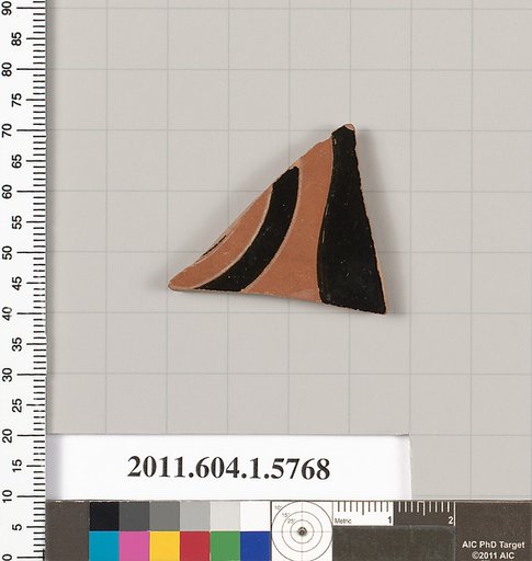 Terracotta fragment of a kylix: eye-cup  (drinking cup)