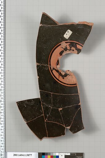 Terracotta fragment of a kylix (drinking cup)