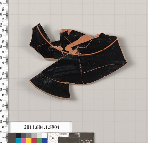 Terracotta fragment of a kylix (drinking cup)