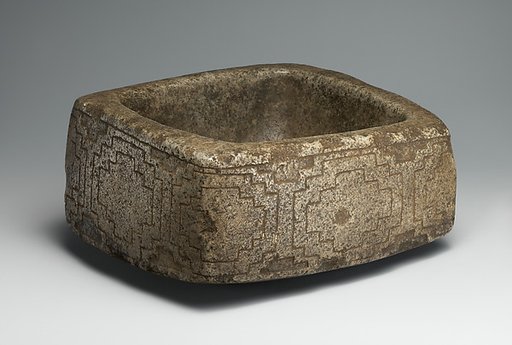 Mortar with incised geometric design