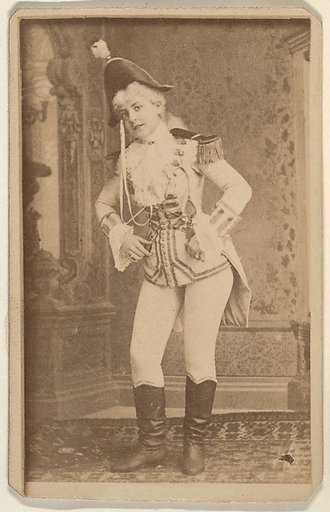 Actress wearing military costume standing with hands on hips, from the Actresses series (N668)