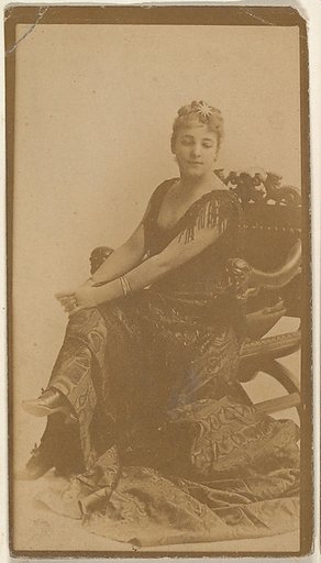 Seated actress with hands resting on knees, from the Actresses series (N668)