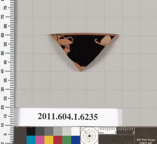 Terracotta rim fragment of a kylix (drinking cup)