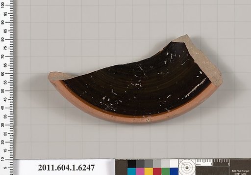 Terracotta fragment of a kylix (drinking cup)
