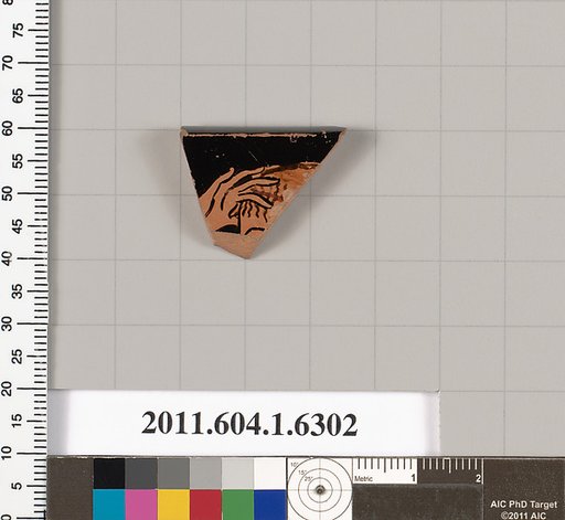 Terracotta rim fragment of a kylix (drinking cup)