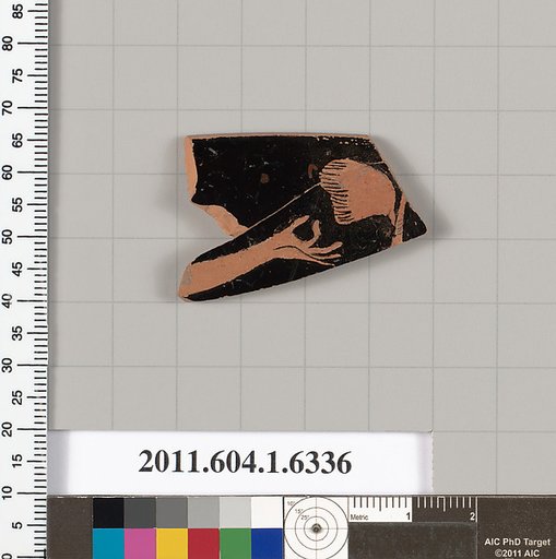 Terracotta rim fragment of a kylix (drinking cup)