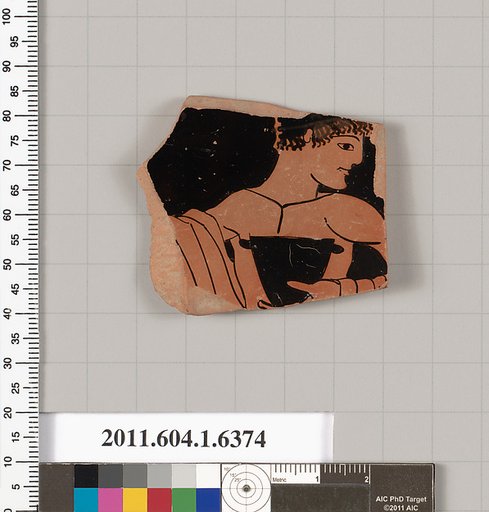Terracotta fragment of a kylix (drinking cup)