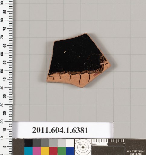 Terracotta fragment of a kylix (drinking cup)