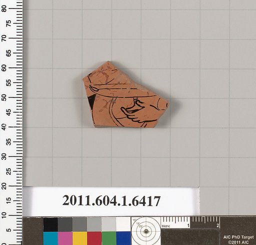 Terracotta fragment of a kylix (drinking cup)