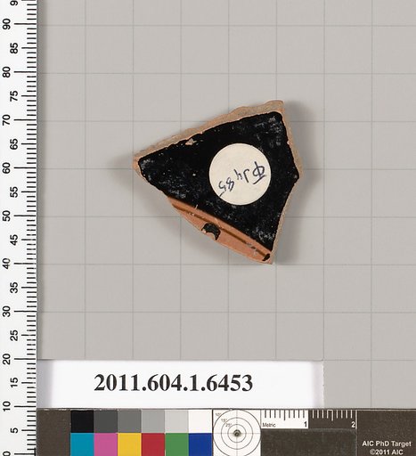 Terracotta fragment of a kylix (drinking cup)