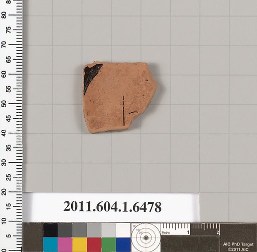 Terracotta fragment of a kylix (drinking cup)