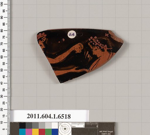 Terracotta rim fragment of a kylix (drinking cup)