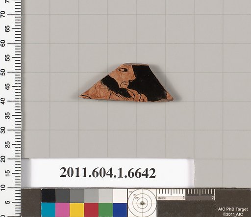 Terracotta fragment of a kylix (drinking cup)