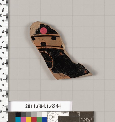 Terracotta fragment of a kylix (drinking cup)
