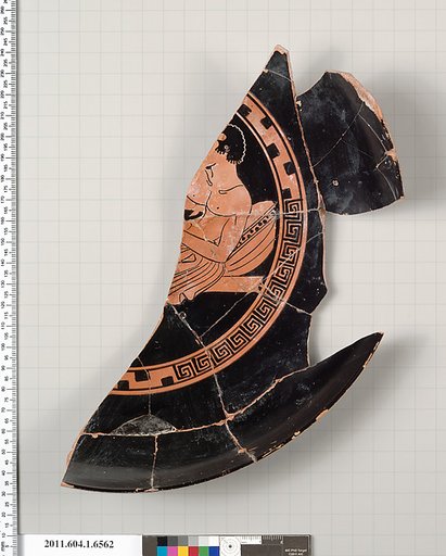 Terracotta fragment of a kylix (drinking cup)