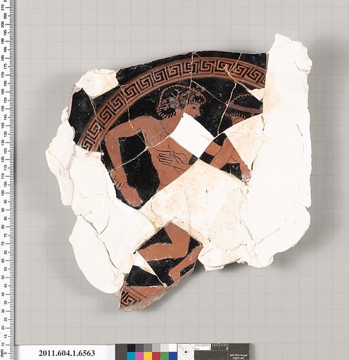 Terracotta fragment of a kylix (drinking cup)