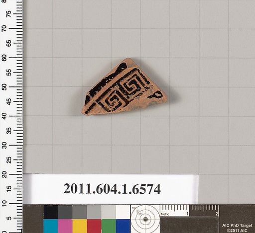 Terracotta fragment of a kylix (drinking cup)