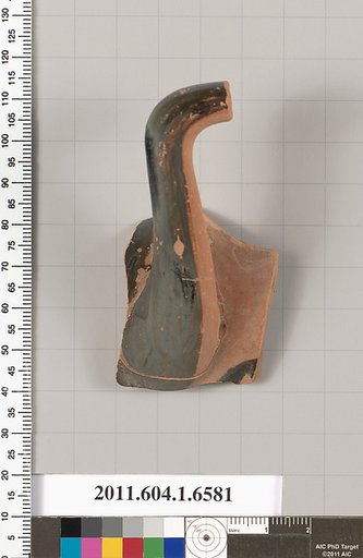 Terracotta fragment of a kylix (drinking cup)