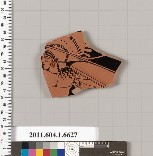 Terracotta fragment of a kylix (drinking cup)
